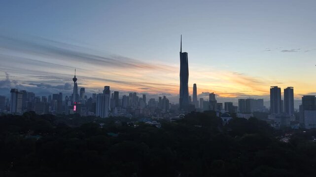kuala lumpur morning scenery 2025 dramatic sunrise and busy street with cars