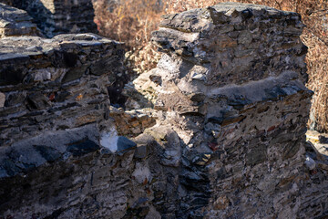 View of part of the destroyed brick wall of an ancient European castle
