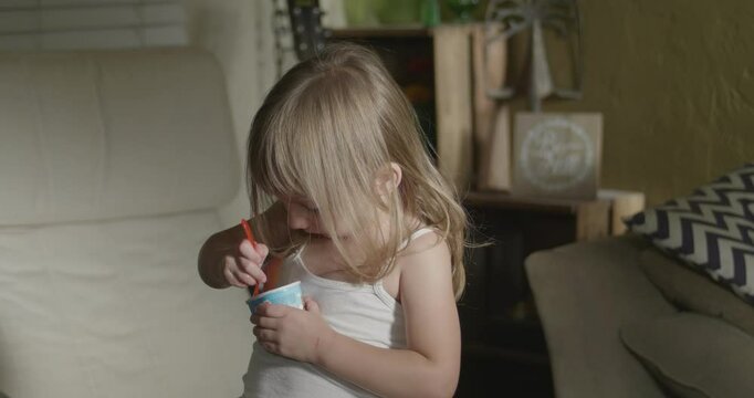 Little Cute Toddler Girl Eating Ice Creme