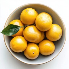 Fresh Yellow Lemons in a Grey Bowl with Green Leaf Garnish