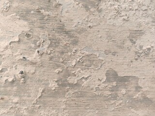 Abstract Grunge Decorative Rough Uneven Stucco Wall Background Art texture.Raw And Weathered Concrete Texture In Soft Gray With Subtle Layered Patterns For A minimalist And Urban Aesthetic Texture.