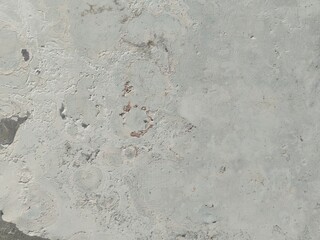 Abstract Grunge Decorative Rough Uneven Stucco Wall Background Art texture.Raw And Weathered Concrete Texture In Soft Gray With Subtle Layered Patterns For A minimalist And Urban Aesthetic Texture.
