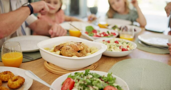 Dining table, food and plate for family in home for holiday, event or reunion with celebration at Easter. Hands, people and conversation with kids, meal and diet for nutrition with lunch at apartment