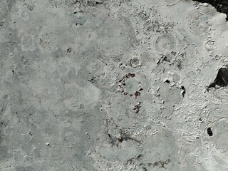 Abstract Grunge Decorative Rough Uneven Stucco Wall Background Art texture.Raw And Weathered Concrete Texture In Soft Gray With Subtle Layered Patterns For A minimalist And Urban Aesthetic Texture.
