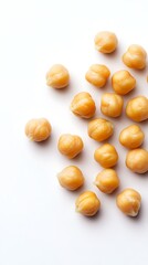 Chickpeas scattered on white background.