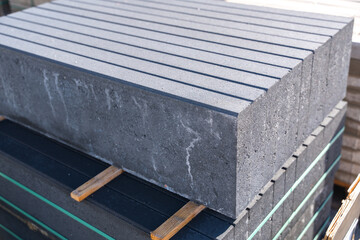 anthracite stones stacked on a palette of one meter by 30 cm, suitable for steps