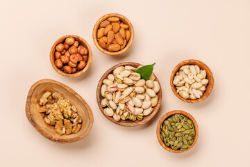 A vibrant assortment of various nuts, including almonds, walnuts, hazelnuts, cashews, and pistachios