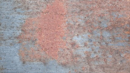 Rust on the iron door for the background. old peeling paint on rusty grates. Rusty metal texture.