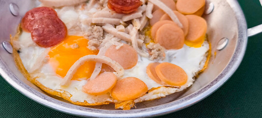 pan-fried egg with pork and toppings. Breakfast food in Thai style