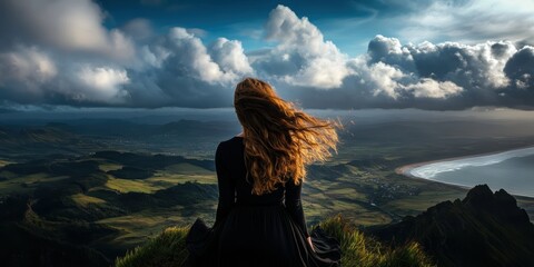 Obraz premium Woman With Flowing Hair Embraces Freedom on a Coastal Hilltop, Surrounded by Nature Under a Bright Blue Sky Generative AI
