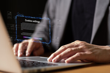 hand using laptop while choose to accept internet cookies policy or reject. Customer data privacy...