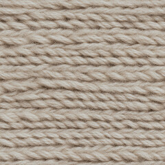 Soft wool knit texture showcases natural fibers in a seamless and cozy arrangement for textile enthusiasts