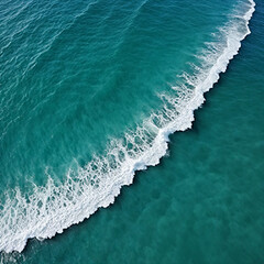 Fototapeta premium Aerial view beautiful of sea waves from drone. Stock image of blue color of ocean water, sea surface. Top view on turquoise waves, clear water surface texture.