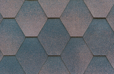 Gray-brown hexagonal shingle roof tiles background