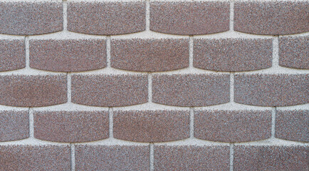 Brown flexible bitumen shingles background close-up