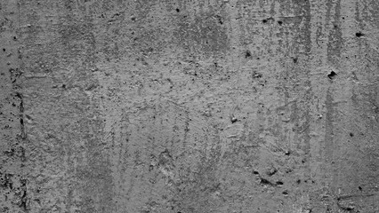 gray background, photo shows texture of concrete wall with remains of old paint