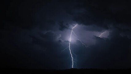 A dark stormy night with lightning flashing in the sky, gloomy, stormy, cloudy