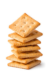 Stacked pile of crispy saltine crackers, isolated on white background