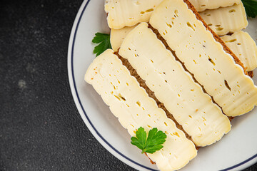 Sandwich soft cheese Camembert or Brie fresh delicious gourmet food background on the table rustic food top view copy space