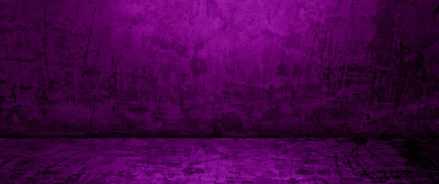 empty purple and dark black studio backdrop. well editing wall and floor concrete perspective for display product and text present. empty room with free space use as backdrop photo in panorama view.