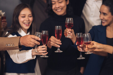 Christmas Day Businessman and business partners are successful, fun and happy at a group celebration party.