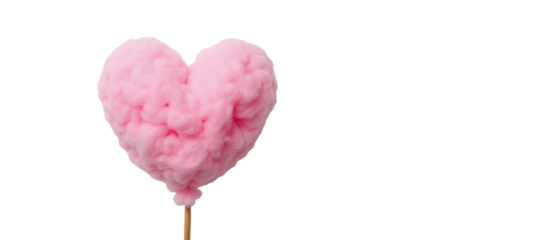 Heart-shaped cotton candy on wooden stick in soft pink color