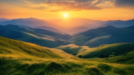 Fototapeta premium Of a Majestic mountain landscape with rolling green hills and a golden sunrise casting warm light over the valley