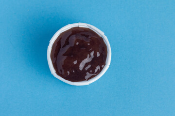 Sauce in paper container
