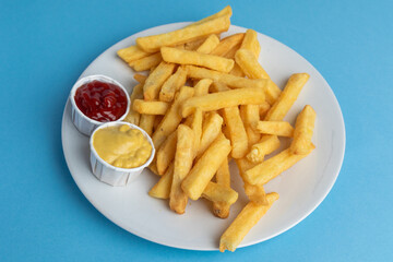 A Plate of Fries and Sauce