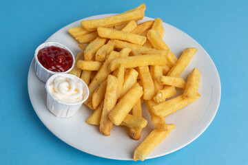 A Plate of Fries and Sauce