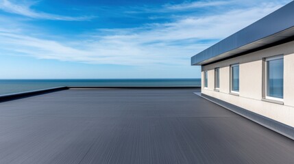 Construction Ash Cement Concept, Modern Industrial Roof Panels with Ocean View under Clear Blue Sky
