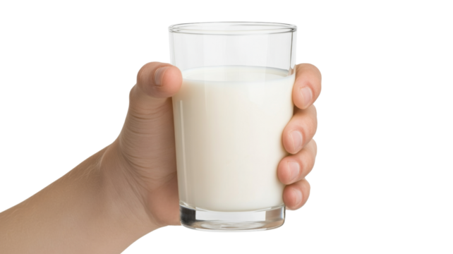 Hand holding glass of milk on transparent background