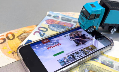 a toy truck is on the banknotes