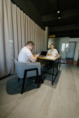 Office workers working together