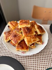 Homemade Turkish whole borek or burek in tray