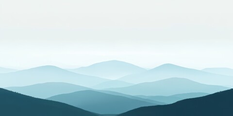 Serene Mountain Range Panorama Under A Misty Sky