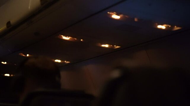 Artificial lighting on board the aircraft. Airplane air traffic control knobs, reading lamps. High quality 4k footage