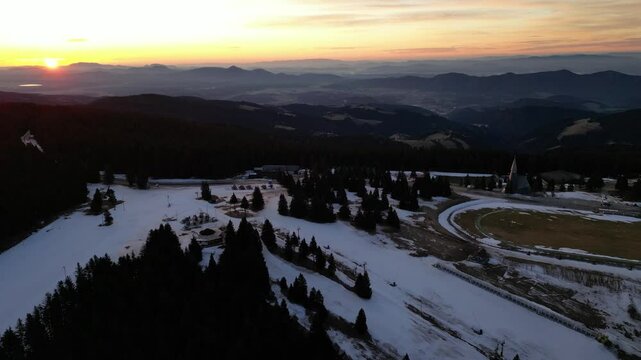Aerial drone morning view of ski resort Rogla at sunrise dawn. Panoramic winter shot of Ski center Rogla, Slovenia