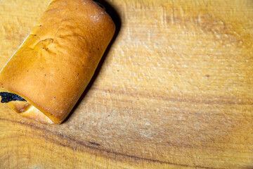 Freshly baked pastry on a wooden cutting board