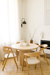 Round wooden table and chairs