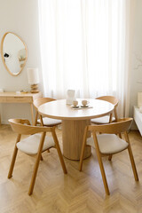 Round wooden table and chairs