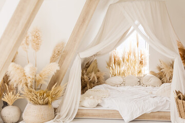 Bedroom with bohemian details decor © aprilante