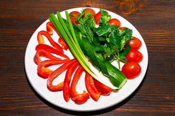 Fresh vegetables arranged on a plate for healthy cooking