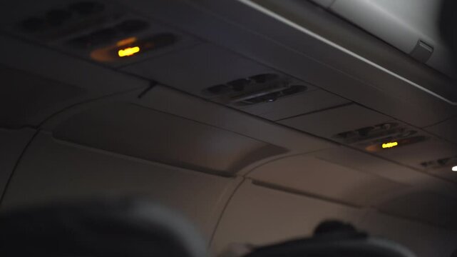The ceiling of a passenger aircraft, where security elements, buttons and switches such as an oxygen mask are located. With the ability to copy. High quality 4k footage
