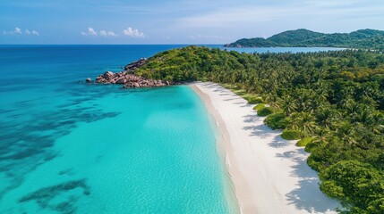 Fototapeta premium Aerial view of a serene tropical beach with clear turquoise waters and lush greenery.
