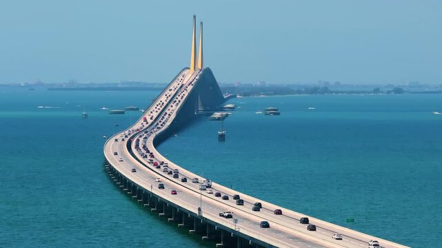 Aerial view of Sunshine Skyway Bridge over Tampa Bay in Florida with moving traffic. Concept of transportation infrastructure