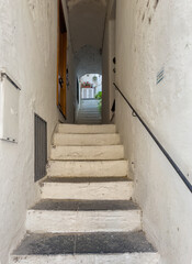Amalfi, Salerno, Italy - July 6, 2024: Salita d'Ancora, narrow alley with big stairs up