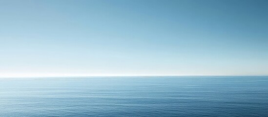 Obraz premium Serene blue ocean with ample white space.