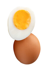 Front view of raw brown chicken eggs and cooked or boiled chicken egg with egg yolk in half in stack isolated with clipping path in png file format