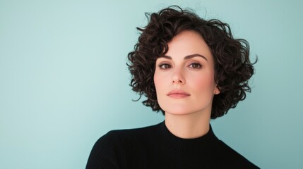 Modern chic hairstyle with voluminous curly layers and faded sides